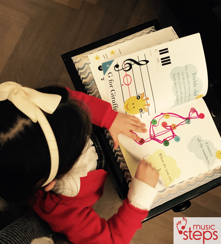 Child working through a Music Steps music activity